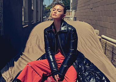 olivia holt in puffer coat and orange pants