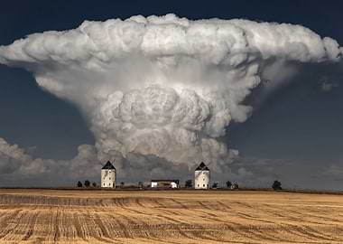 Dramatic storm clouds over windmills