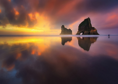 Dramatic Sunset Reflection on Beach
