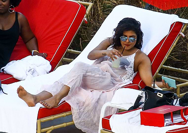 Priyanka Chopra relaxing by the pool