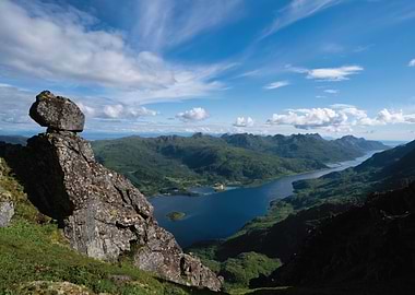 Dramatic mountain landscape with balanced rock