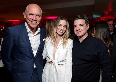 Margot Robbie with two men