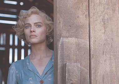 Margot Robbie in a blue dress