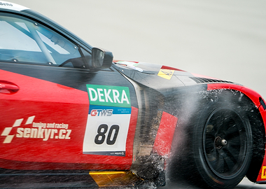 Race Car Driving Through Water