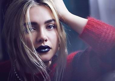 Florence Pugh with dark lipstick and red sweater