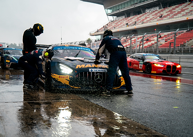 Race car pit stop in the rain