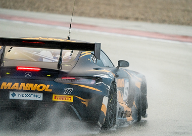 Racing car on a wet track