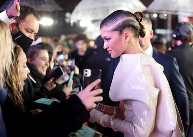Zendaya interacts with fans at an event