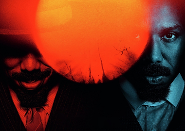 Two men in dramatic lighting