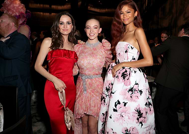 Three women in formal gowns