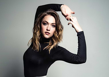 Violett Beane in black turtleneck posing