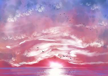 Birds flying over a sunset ocean