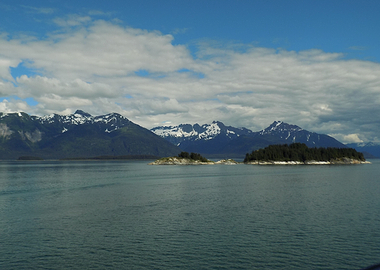 Snow-capped mountains and sea lion island