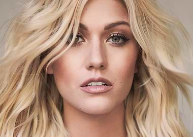 Close-up of a blonde Katherine McNamara