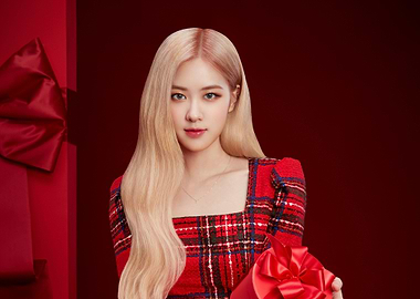 Rosé in a Plaid Dress with Gifts