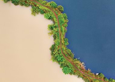 Aerial View of Contrasting Water Bodies and Path