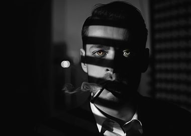 Man with striking eyes smoking