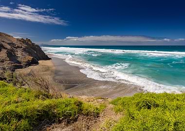 Rugged Coastline with Turquoise Ocean Waves