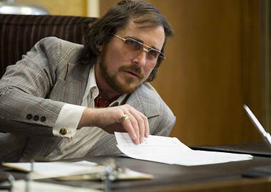Christian Bale as Irving Rosenfeld