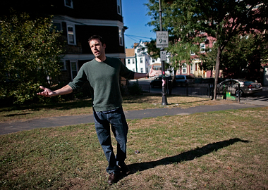 Man gesturing in a park