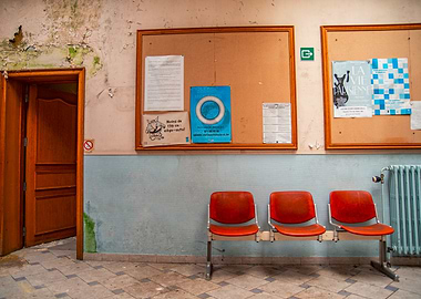 Abandoned Waiting Room with Chairs and Bulletin Boards