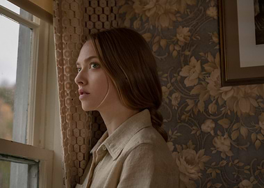 Woman looking out a window