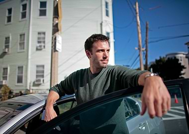 Ben Affleck leaning on car door