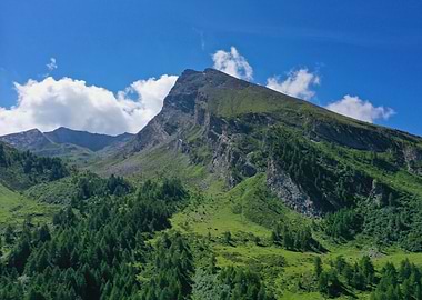 Majestic Mountain Peak Under Blue Sky