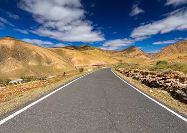 Winding Road Through Arid Hills