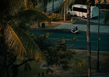 Scooter rider on a tropical street