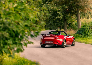 Red Mazda MX-5 on a Country Road