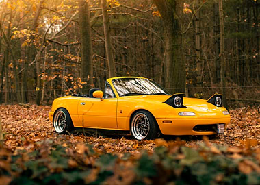 Yellow Mazda Miata in Autumn Forest