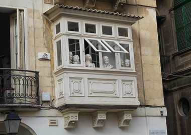 Balcony with Busts and Ornate Architecture