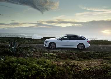 White Audi Station Wagon by the Ocean