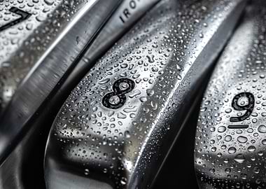 Golf Irons with Water Droplets Close-up