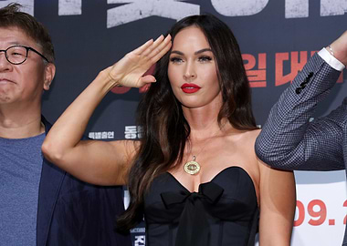 Megan Fox Salutes at Event