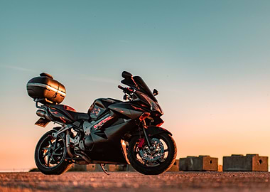 Black Honda VFR Motorcycle at Sunset