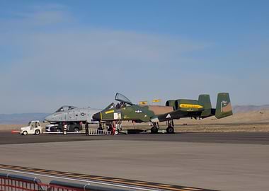 Two A-10 Thunderbolt II aircraft on tarmac