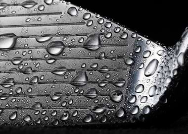 Golf Club with Water Droplets