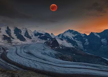 Blood Moon Over Glacial Mountains