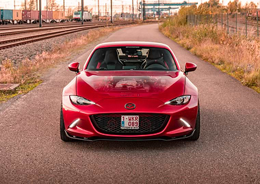 Red Mazda MX-5 Miata on Road