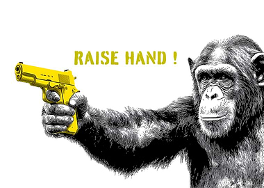 Chimpanzee holding a yellow gun
