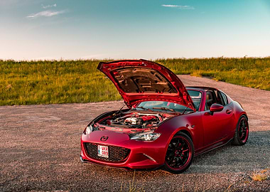 Red Mazda MX-5 with Hood Open