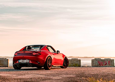 Red Mazda MX-5 at Sunset