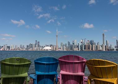 Colorful Chairs Facing Toronto Skyline