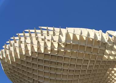 Modern Wooden Structure Against Blue Sky
