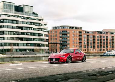 Red Mazda MX-5 on a City Street