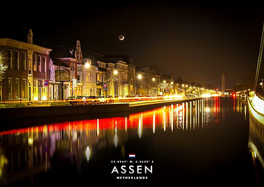 Night cityscape with canal reflections