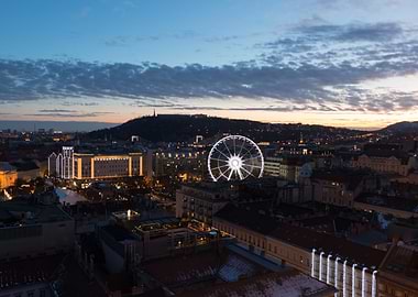 Cityscape at Dusk with Ferris Wheel