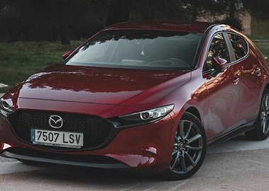 Red Mazda 3 Hatchback